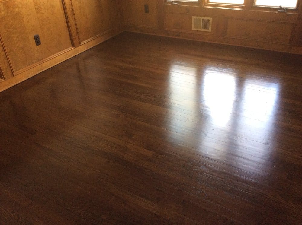 Empty room with a satin finished hardwood floor