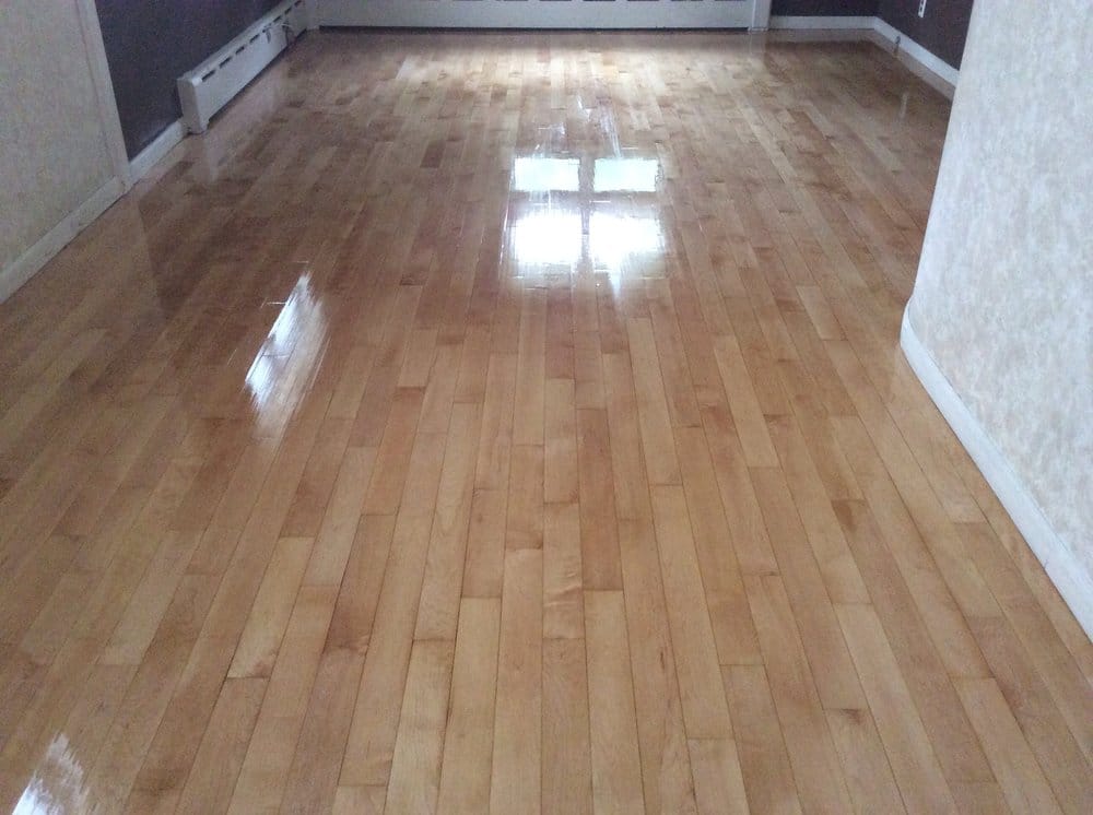 Highly reflective mirror finish hardwood floor