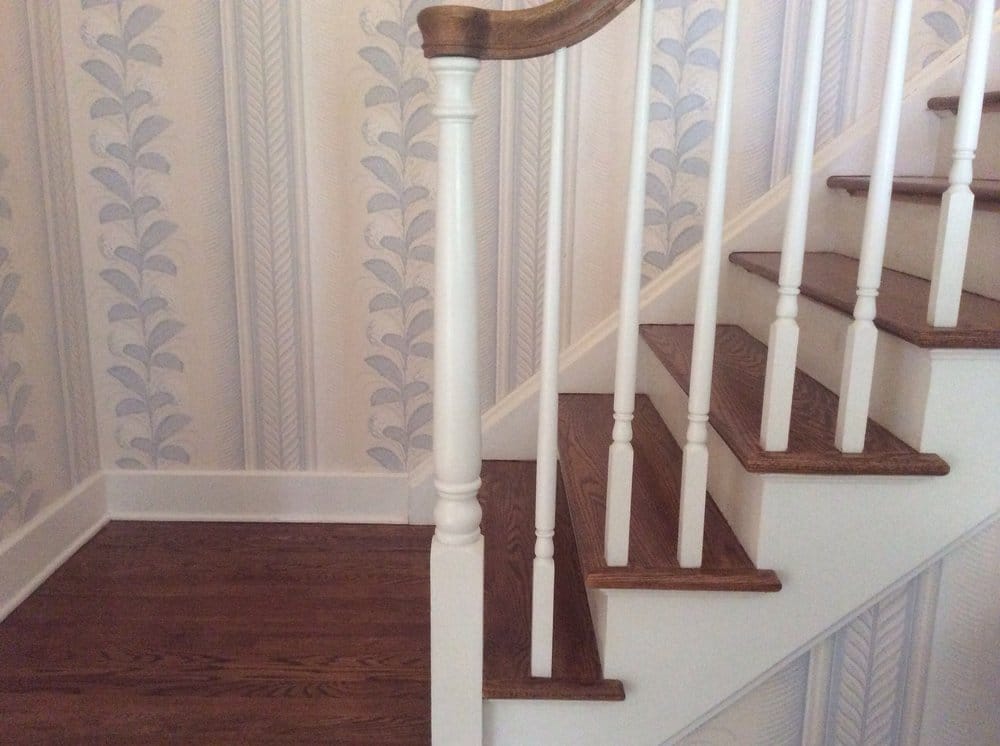 Straight staircase with refinished wood treads